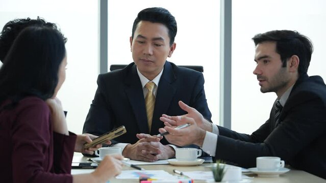 Business people in meeting room at workplace discussing and business planning with brainstorming meeting in office. Businessman and businesswoman analysis market trading with customer partnership.