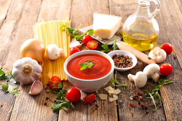 Italian spaghetti with fresh ingredients ( tomato sauce, parmesan, tomato, spices)