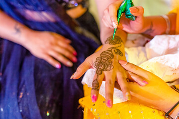 Indian Hindu bride's henna mehendi mehndi hands close up