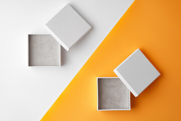Jewelry box on yellow background top view