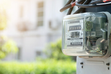 Electricity meter on a light pole. Energy and economic concepts. - obrazy, fototapety, plakaty