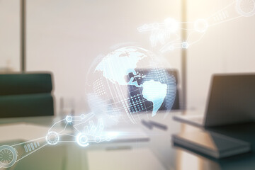 Creative concept of robotics technology with globe sketch and modern desktop with computer on...