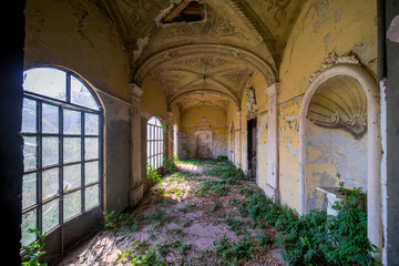 Frescoed corridor in an abandoned house