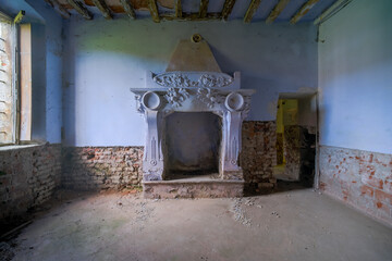 fireplace with floral decorations in an abandoned house