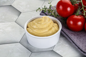 Dijon mustard sauce in the bowl