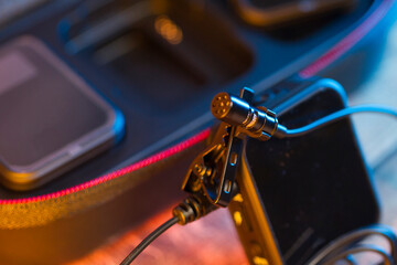 Close up on wireless microphones for modern video recording.