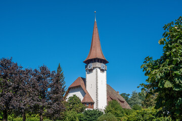 Fototapeta na wymiar Reformed church in Spiez built in 1907, Bernese Oberland in the canton of Bern Switzerland.