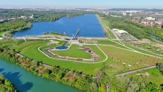Torcy, France: Aerial view of lake Lac de Vaires-sur-Marne, sunny summer day with clear blue sky - landscape panorama of Europe from above
