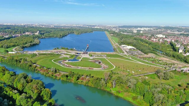 Torcy, France: Aerial view of lake Lac de Vaires-sur-Marne, sunny summer day with clear blue sky - landscape panorama of Europe from above
