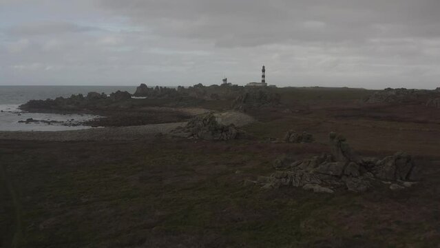 Aerial view of The Creac'h Lighthouse In Ushant and strong storm coming from the side.
