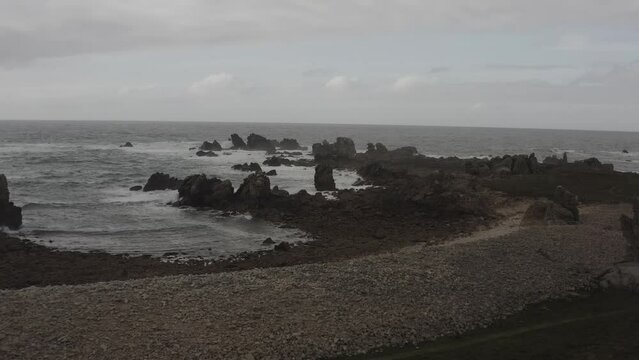 Aerial view of Oussant/Ushant in Bretagne, France. Strong wind and big waves coming ashore.