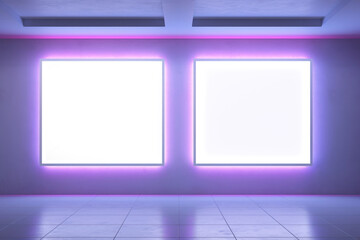 Mock-ups of white billboards with neon lighting hang in the underpass