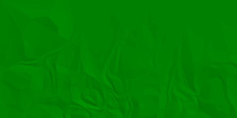 Sheet of crumpled green paper as background, top view. Sheet of color crumpled paper as background. Space for design	