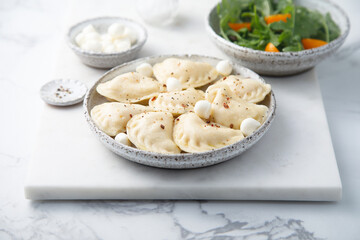 Homemade dumplings with cheese