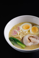 Ramen Japanese noodle isolated in black background