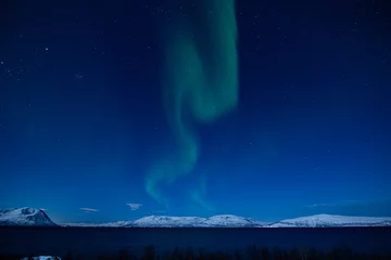  aurora borealis in the mountains and lake © Sbastien