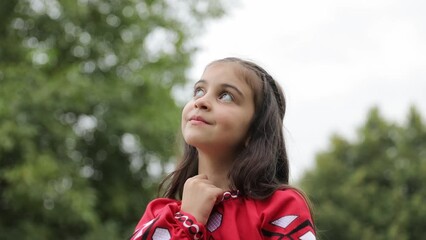 A beautiful Ukrainian girl in a traditional Vyshyvanka national dress. Ukrainian children of war. 