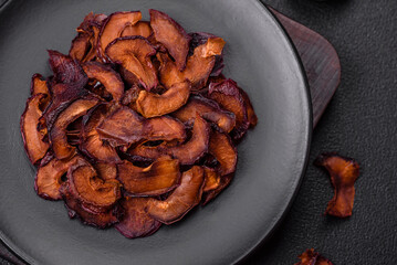 Fresh sweet blue plum sliced and dried