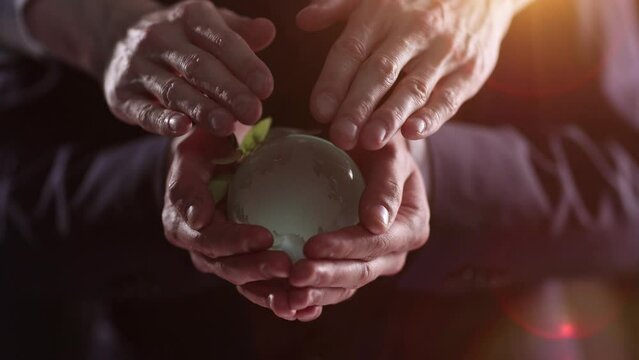 Glass Earth globe ib the hand. Ai generated