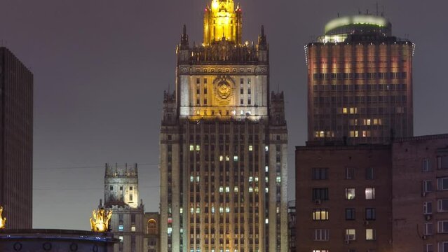 Winter Night Timelapse Hyperlapse of Borodinsky Bridge over Moskva River and Ministry of Foreign Affairs Building on Smolenskaya Square, Moscow