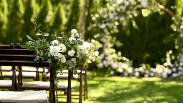 Wedding ceremony. Very beautiful and stylish wedding arch, decorated with various fresh flowers