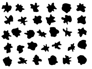 Obraz premium Set in shapes of random liquid black spots dropped