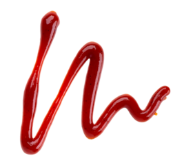 Red ketchup splashes isolated on white background. Drizzle of Barbecue sauce. Top view.