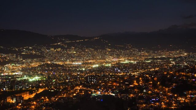 Dusk to night timelapse view of Medellin cityscape, Antioquia Department, Colombia.