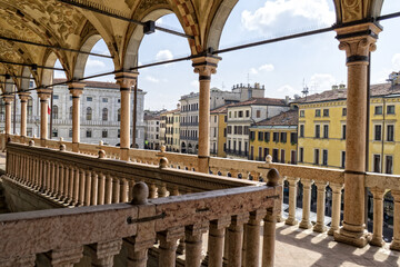 Panoramic view of the porticoed terrace of Palazzo della Ragione, Sala della Ragione in Piazza delle Erbe and the roofs of the surrounding historic buildings.