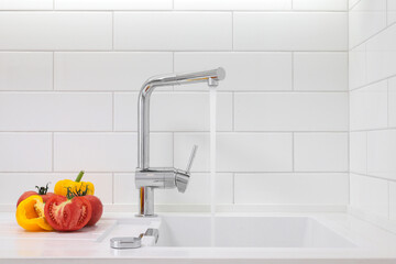 Faucet with granite sink in the kitchen