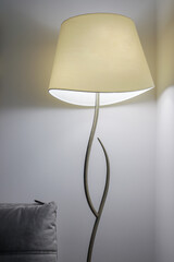 Glowing floor lamp close-up in the room