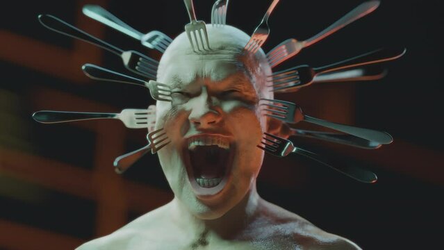 Close up of a screaming bald man with metal forks stuck into his head. Pain, depression, headache, migraine, anxiety concept.Suffering, schizophrenia . Surrealistic symbolic video. Mental disorder. 