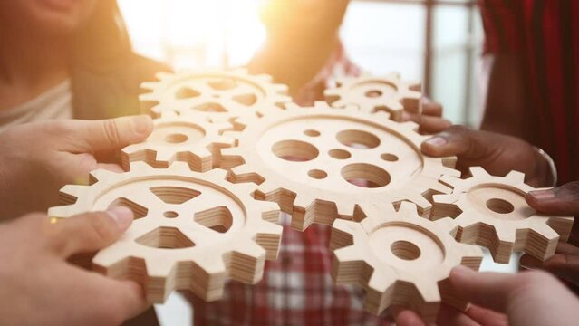 Diverse colleague business people showing symbol of visionary system and mechanism for business success.
