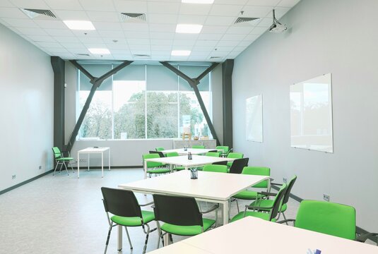 bright study room with large windows and green chairs, office, classroom, background image for studying