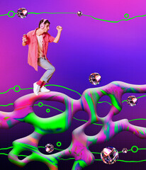 Young guy in casual clothes listening to music and dancing over abstract background. Contemporary...