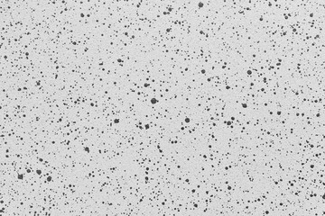 Gray quartz background or texture with black dots