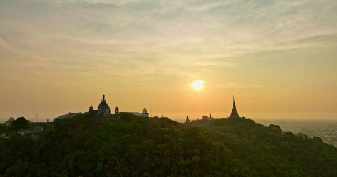 aerial view The rays of the sun shine on the top of the castle..The rays of the yellow sun pierced through the palace..Bright sky in the morning sun above the hilltop palace..Phetchaburi 