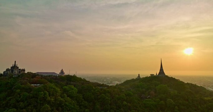 aerial view The rays of the sun shine on the top of the castle..The rays of the yellow sun pierced through the palace..Bright sky in the morning sun above the hilltop palace..Phetchaburi city 