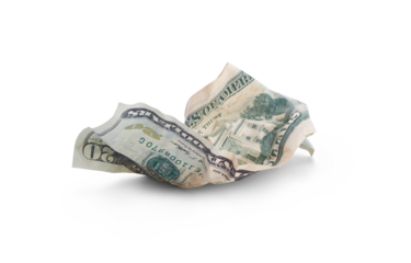 A crumpled 20 American dollars lying on the ground after being thrown away, wasting money, isolated against a transparent background.