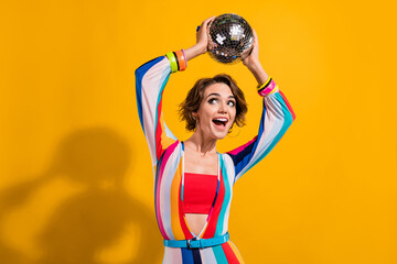 Photo of hippie youth memories girl carnival hold discoball shine vintage outfit advert look empty...
