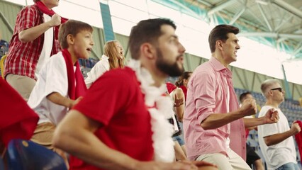 Young emotional people, sport fans attending live football match to cheer up favourite team. Sport enthusiasts. Concept of sport, cup, world, team, event, competition, emotions, championship, betting