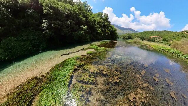 The Blue Eye natural water pool, in southern Albania is formed by an underground river that emerges from a depth of over 50 meters or 164 feet and creates a beautiful circular pool. Aerial view