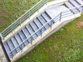 Concrete staircase. Staircase, steps made of metal and concrete blocks. Rise, step in the park.