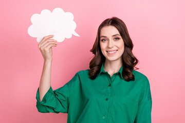 Photo of excited dreamy lady wear green shirt holding mind cloud empty space isolated pink color...