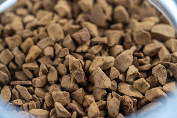 Instant coffee powder against a white background