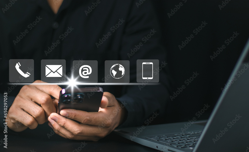 Poster businessman using laptop pc with contact icons on virtual screen. searching web, browsing informatio