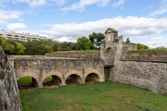 Citadel in Pamplona Spain, an old fortress with a wall and a bridge. 