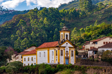Old baroque church on top of the hill in the historic city of Ouro Preto in Minas Gerais, Brazil