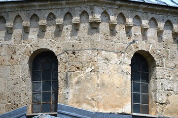 window on the old stone church