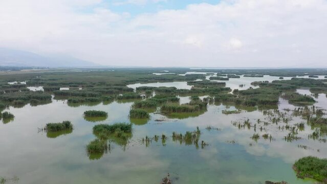 Aerial view from a drone of the clouds reflected in the waters of Lake Eber, one of the natural beauties of Afyonkarahisar.